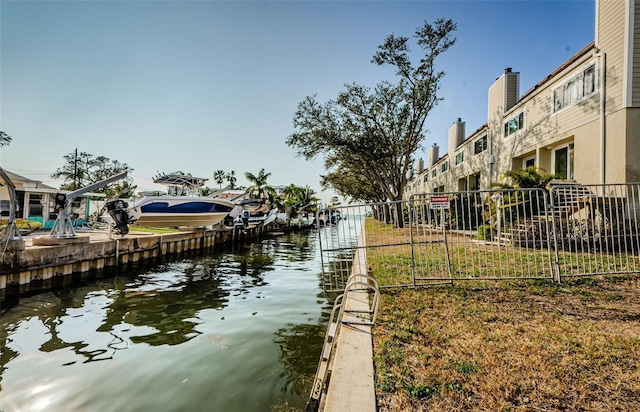 dock area with a water view