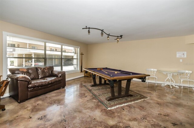 game room with concrete floors and billiards