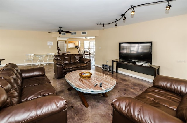 living room featuring ceiling fan