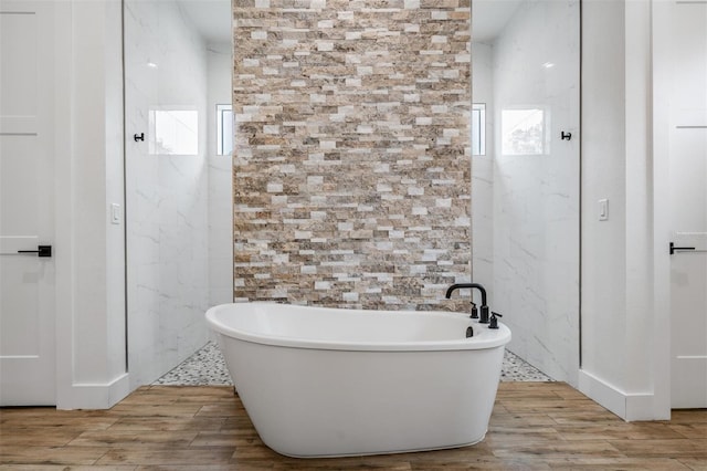 bathroom featuring a tub