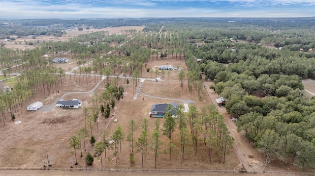 birds eye view of property featuring a rural view