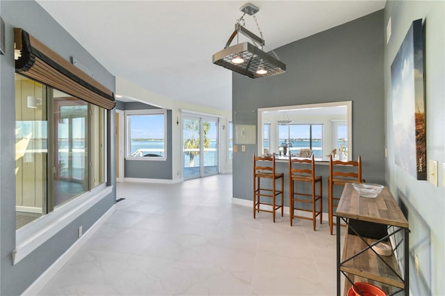 dining area with a water view