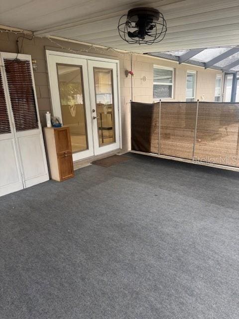 view of patio / terrace featuring ceiling fan and french doors