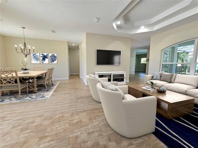 living room with a chandelier