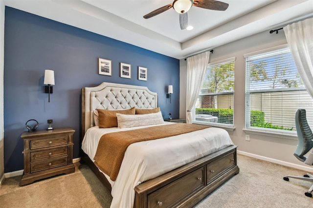 bedroom featuring ceiling fan and light colored carpet