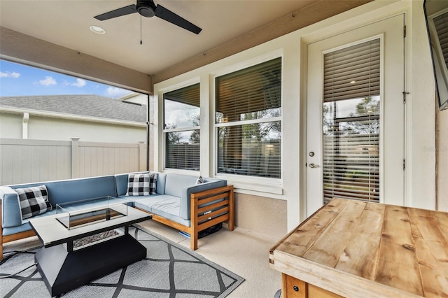 view of patio featuring outdoor lounge area and ceiling fan