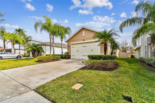 view of front facade featuring a garage and a front yard