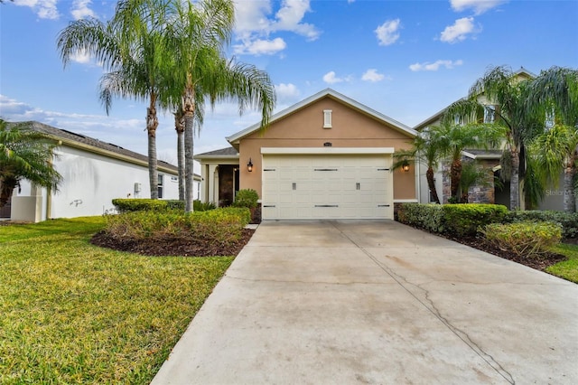 single story home with a front yard and a garage