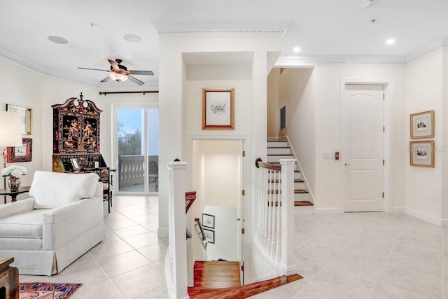 interior space featuring crown molding and light tile patterned flooring