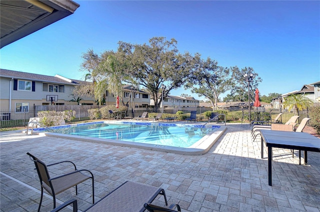 view of swimming pool featuring a patio