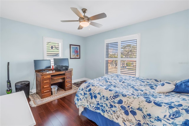 bedroom featuring ceiling fan and dark wood-type flooring