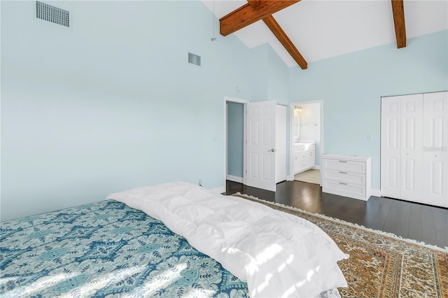 bedroom with high vaulted ceiling, ensuite bathroom, dark hardwood / wood-style floors, beam ceiling, and a closet