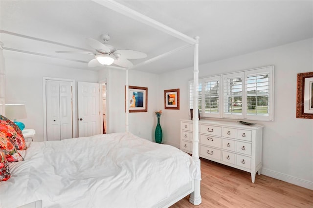 bedroom with ceiling fan and light hardwood / wood-style floors