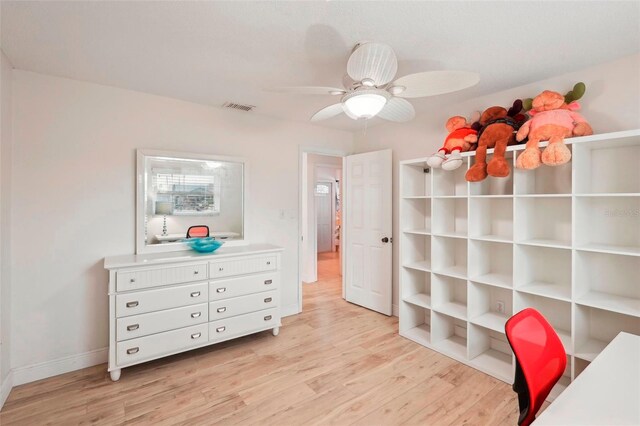 bedroom featuring ceiling fan and light hardwood / wood-style flooring