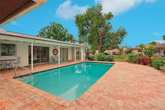 view of pool with a patio