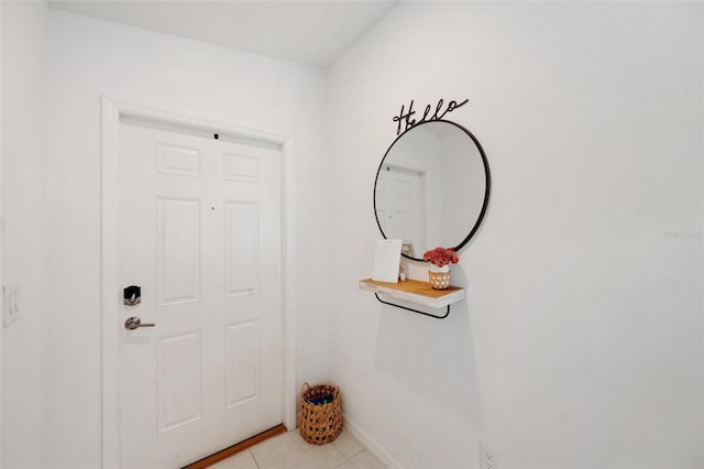 entryway featuring light tile patterned floors