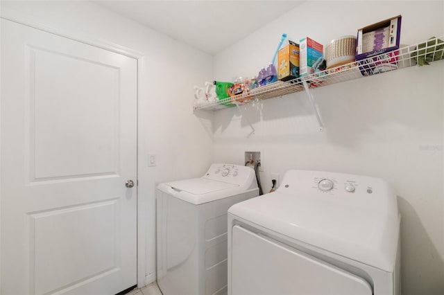 laundry area with washer and clothes dryer