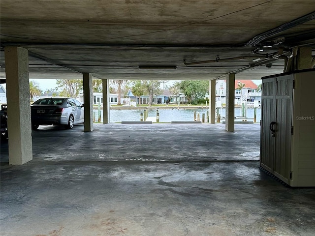 garage featuring a water view