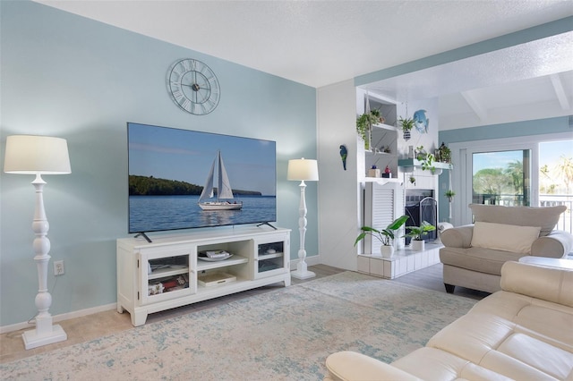 living room featuring beam ceiling