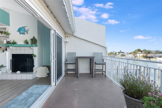 balcony featuring a water view