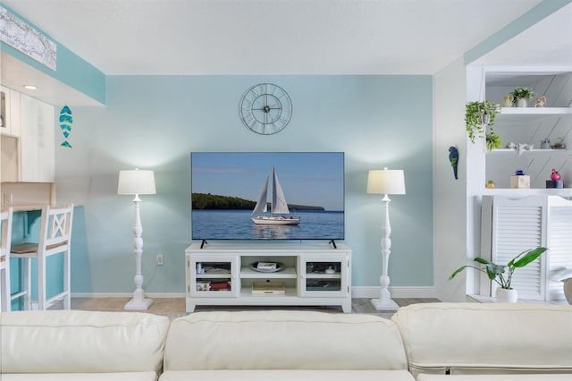 322 Windrush Blvd Unit 2, Indian Rocks Beach, FL 33785 - living room with baseboards
