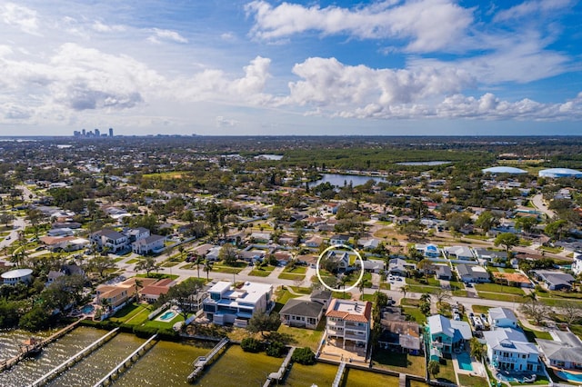 drone / aerial view with a water view