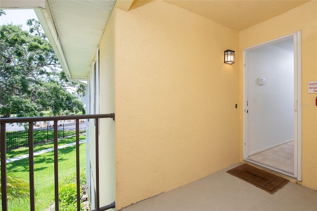 property entrance with a balcony