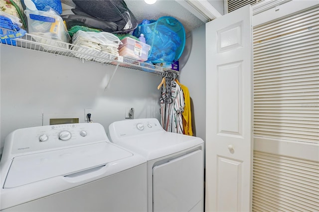 laundry room featuring washer and clothes dryer