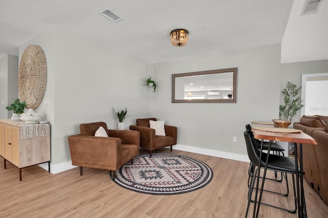 living area with light wood-type flooring