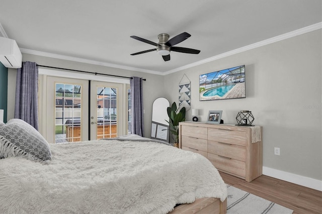 bedroom with ceiling fan, french doors, dark hardwood / wood-style floors, a wall mounted AC, and access to outside