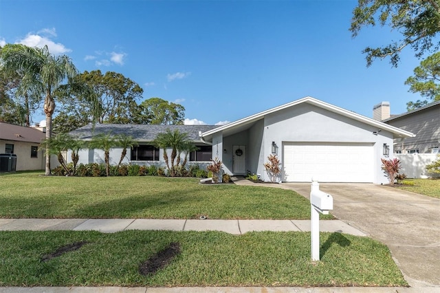 ranch-style house with a front lawn and a garage