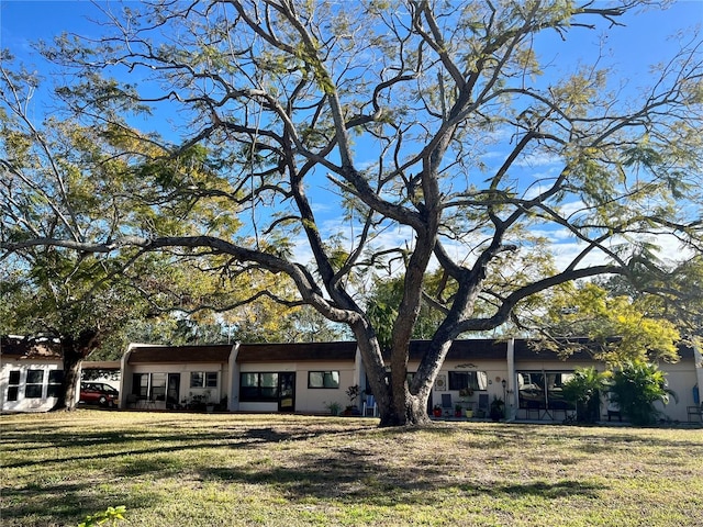 view of front of home with a front yard