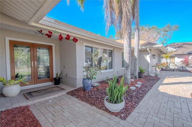 entrance to property featuring french doors