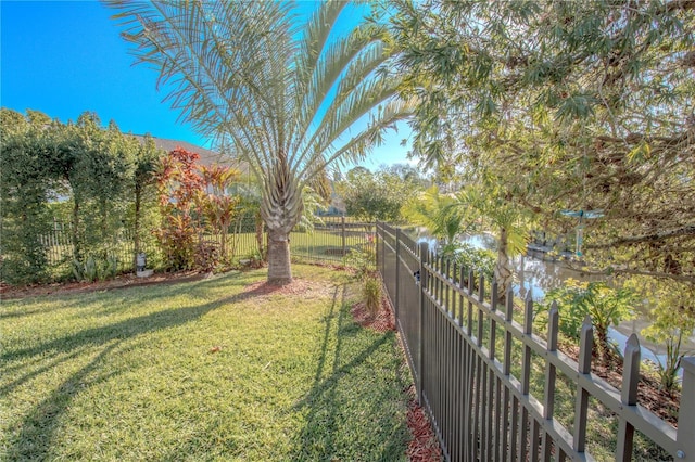 view of yard with a water view