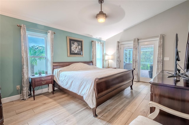 bedroom with lofted ceiling and ceiling fan