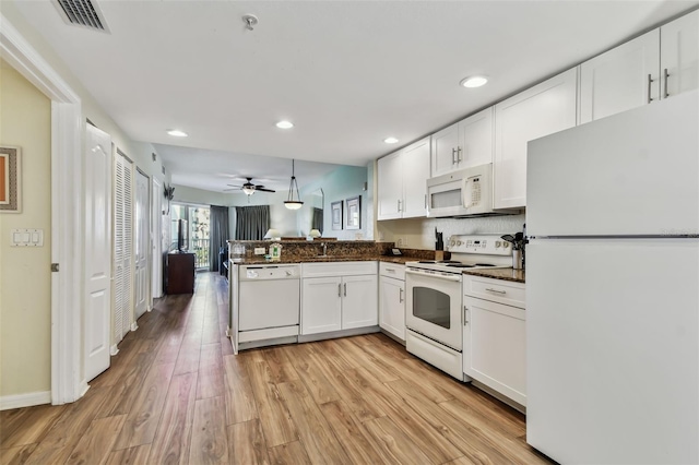 kitchen with white cabinetry, ceiling fan, light hardwood / wood-style flooring, kitchen peninsula, and white appliances