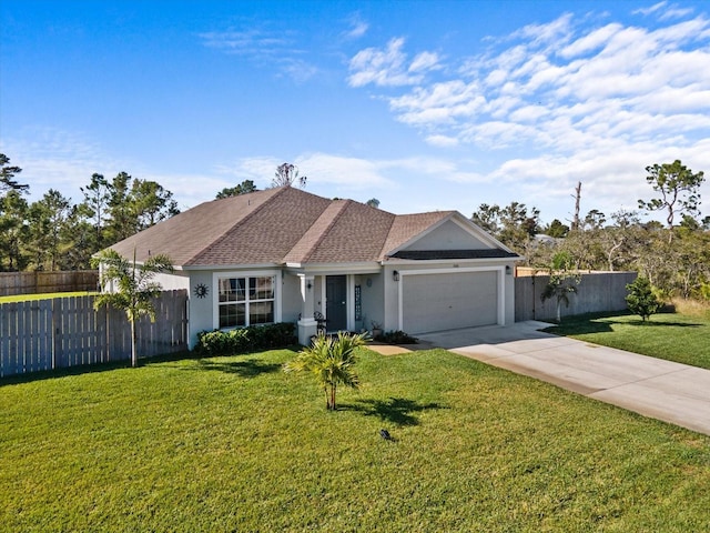 ranch-style house featuring a garage and a front lawn