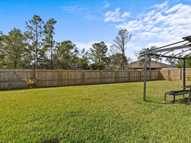 view of yard with a lanai