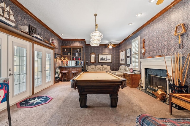 rec room featuring carpet flooring, crown molding, billiards, and bar area