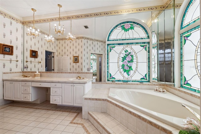 bathroom featuring vanity, tile patterned floors, ornamental molding, independent shower and bath, and a notable chandelier