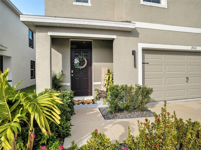 entrance to property featuring a garage