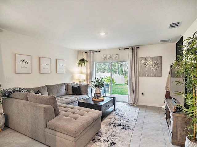 living room featuring light tile patterned flooring