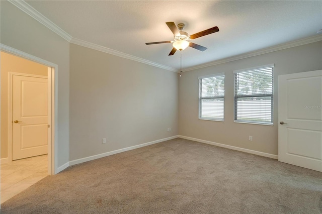 empty room with light carpet, ceiling fan, and ornamental molding