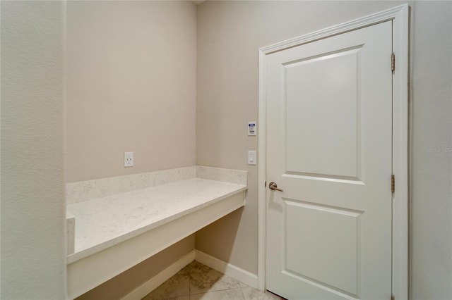 bathroom featuring tile patterned flooring