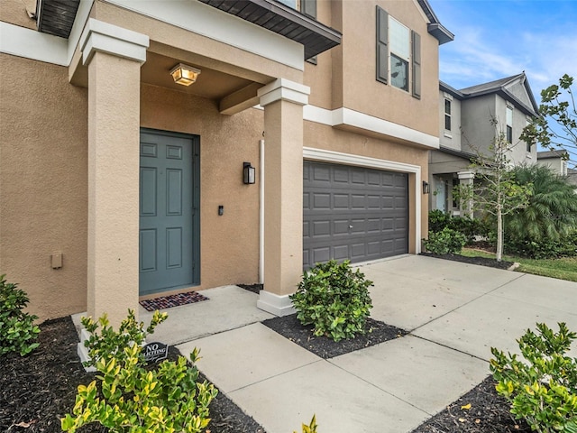 property entrance featuring a garage