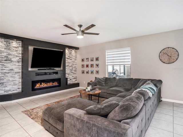 tiled living room featuring ceiling fan