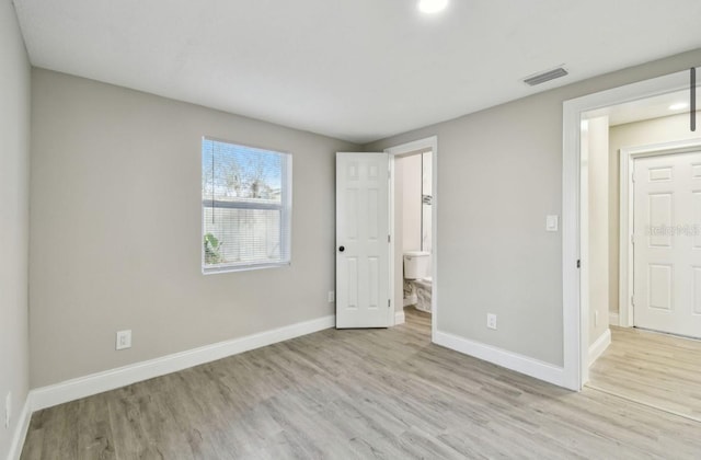 unfurnished bedroom with light hardwood / wood-style flooring