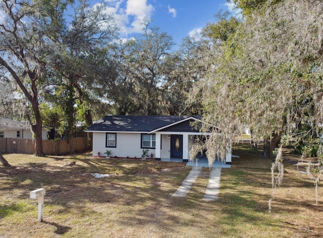 view of front of home with a front lawn