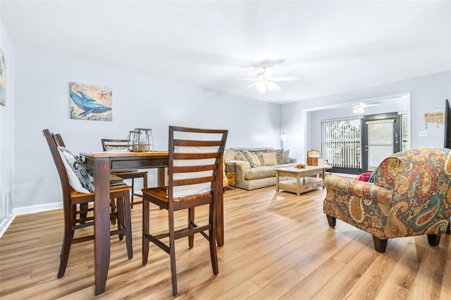 dining area featuring ceiling fan and light hardwood / wood-style flooring