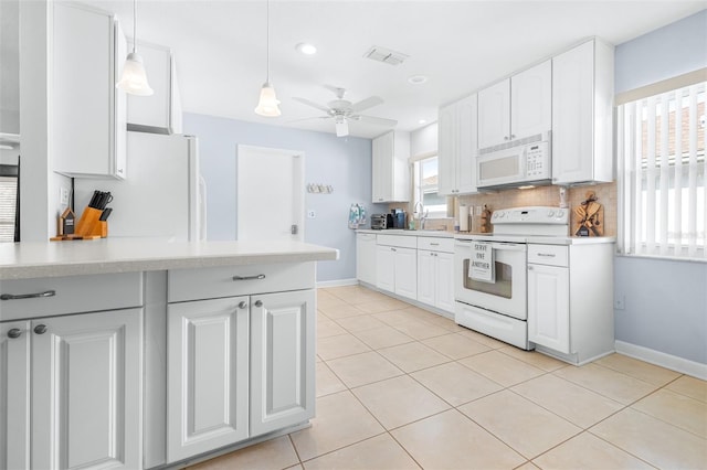 kitchen featuring white cabinetry, white appliances, decorative light fixtures, and ceiling fan